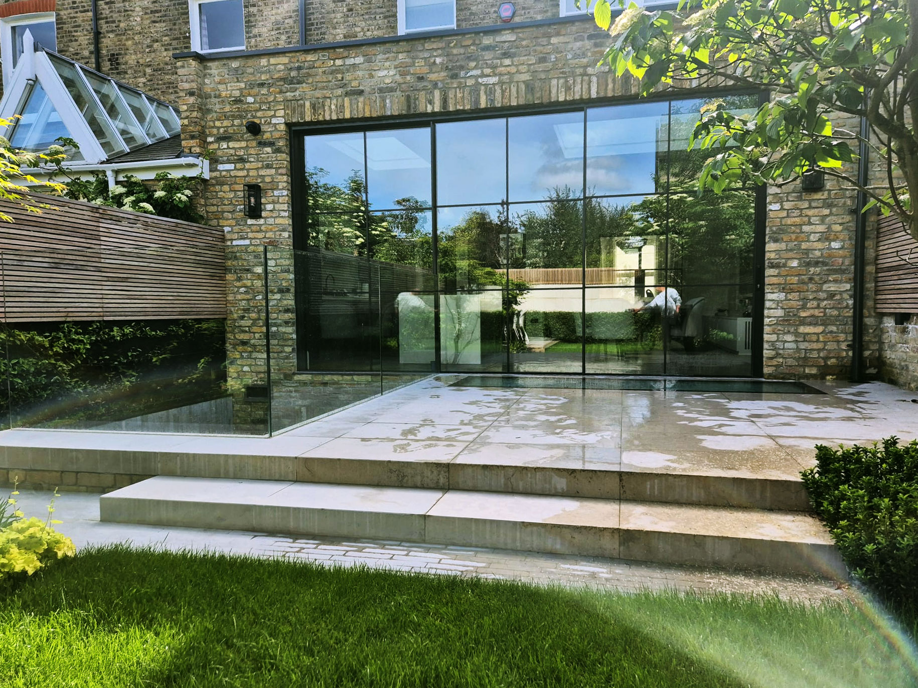 External Cortizo doors with cosmetic bars. Aluminium external doors for a new extension in London